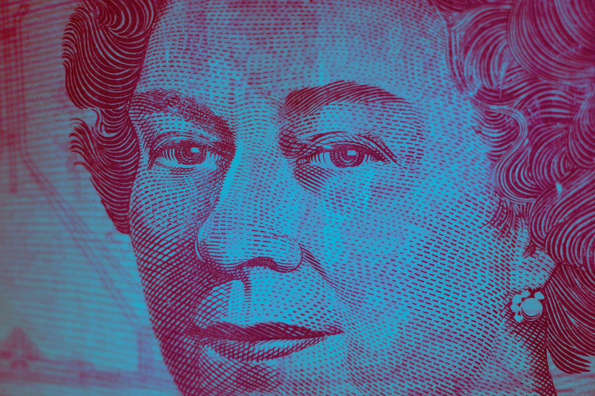 A colourised version of a UK banknote. Photo by VanveenJF on Unsplash.