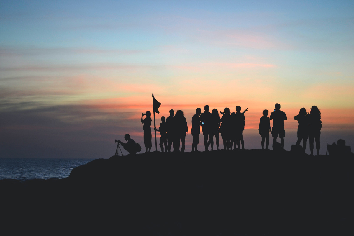 People watching the sunset