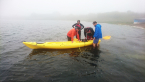 On a lake with a kayak based, hubless onboard motot prototype research and development.